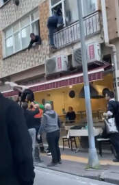 Pendik'te kelepçeli şüpheli saklandığı evin penceresinde yakalandı