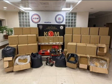 Manisa'da kaçak sigara ve silah operasyonu