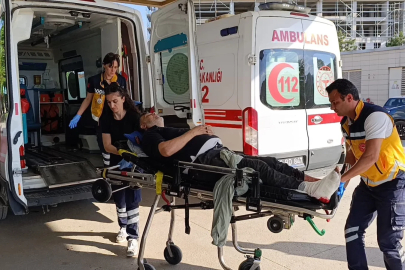 Bursa'da devrilen makinenin altında kalan işçi yaralandı 
