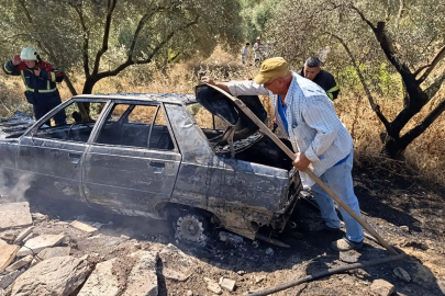 Yanan otomobilini uzaklaştırıp, alevlerin ormana sıçramasını önledi